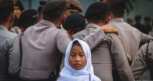 December 8, 2017 - Central Jakarta, Jakarta, Indonesia - A little girl during a protest against US President Donald J. Trump decision to recognize Jerusalem as Israel's capital in front of the U.S. embassy in Jakarta, Indonesia on 08 december 2017. Hundreds of people across the most populous Muslim country staged protests Friday against Trump administration's policy shift on the contested city. (Credit Image: © Afriadi Hikmal via ZUMA Wire)