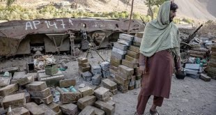 A Taliban fighter with weapons and ammunition reportedly recovered from caches in Afghanistan's Panjshir Valley, Sept. 14, 2021. On a recent visit, few civilians were about and signs of heavy fighting between the Taliban and any insurgency were scarce. What remained were opposing narratives, claims of massacres, ethnic cleansing and false charges. (Jim Huylebroek/The New York Times)Credit: New York Times / Redux / eyevineFor further information please contact eyevinetel: +44 (0) 20 8709 8709e-mail: info@eyevine.comwww.eyevine.com