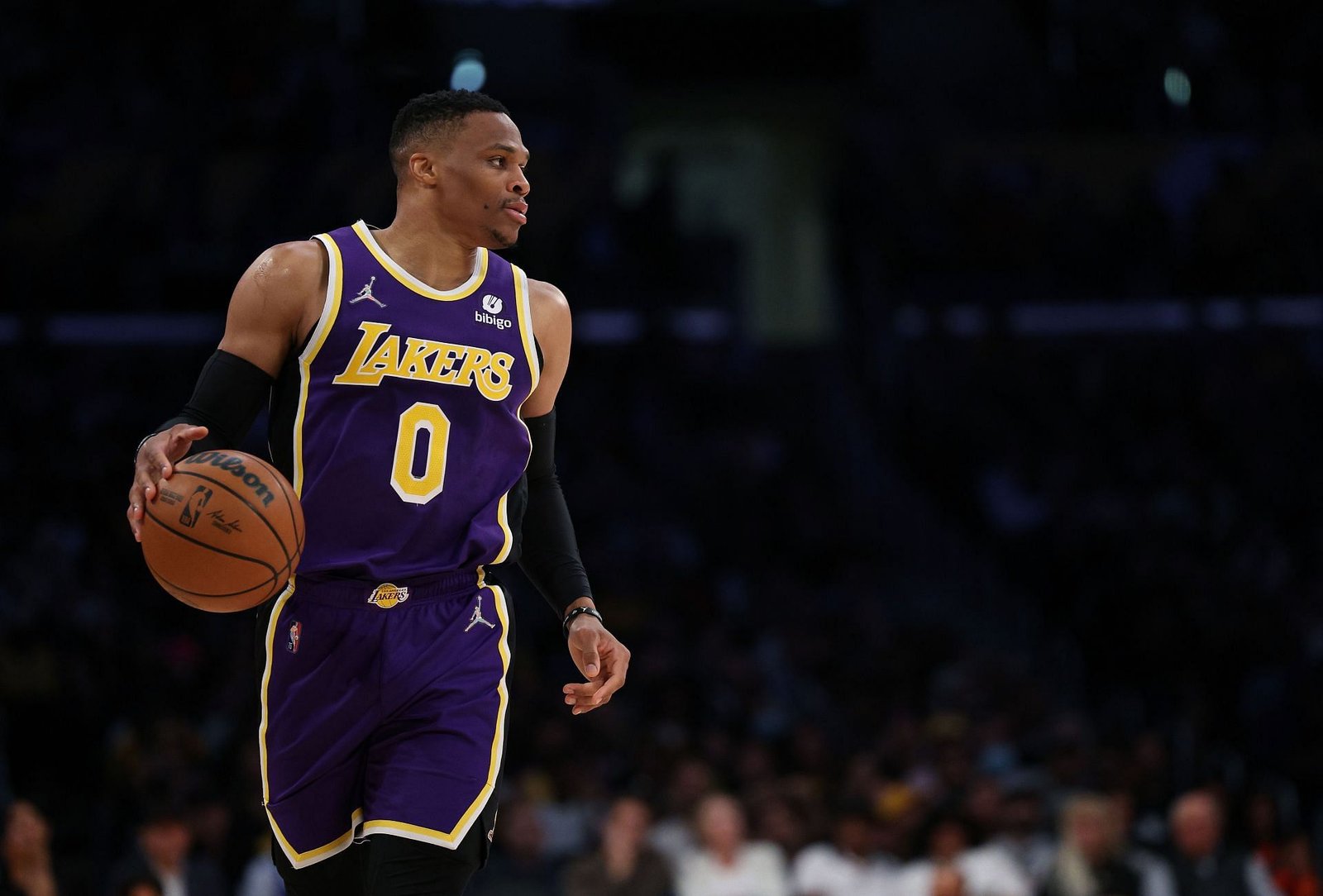 Russell Westbrook #0 of the Los Angeles Lakers brings up the ball during a 126-121 Philadelphia 76ers win at Crypto.com Arena on March 23, 2022, in Los Angeles, California.