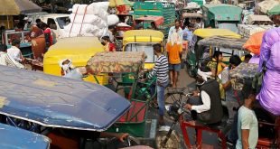 Auto-rickshaws sit in traffic near Sadar Bazaar in New Delhi, India, on Wednesday, Nov. 20, 2019. In the heart of New Delhi's largest wholesale bazaar, merchants who normally compete with each other have united against a common enemy. The sit-in, which created more chaos than usual among the rickshaws, motorbikes and ox-carts plying the market road, was one of as many as 700 protests against Amazon.com Inc. and Walmart Inc. -- owner of local e-commerce leader Flipkart -- that organizers say took place at bazaars across India on a recent Wednesday. Photographer: Anindito Mukherjee/Bloomberg via Getty Images