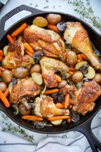 One Pan Chicken and Potatoes in a cast iron skillet
